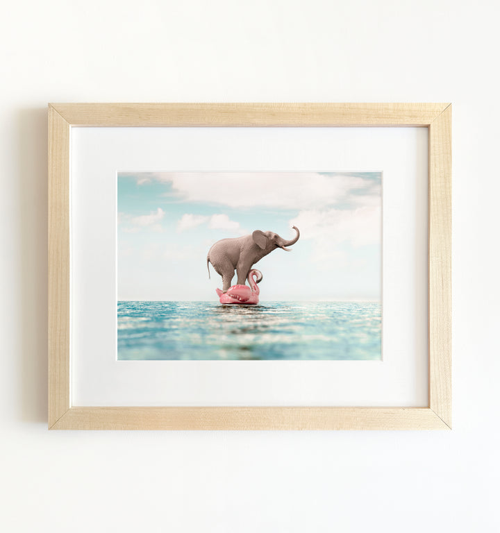 Elephant Afloat a Flamingo