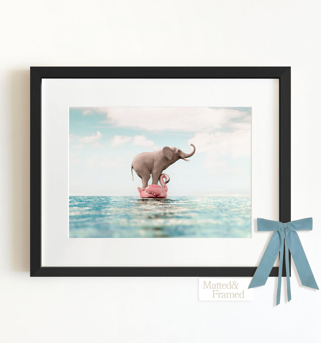 Elephant Afloat a Flamingo Framed Art