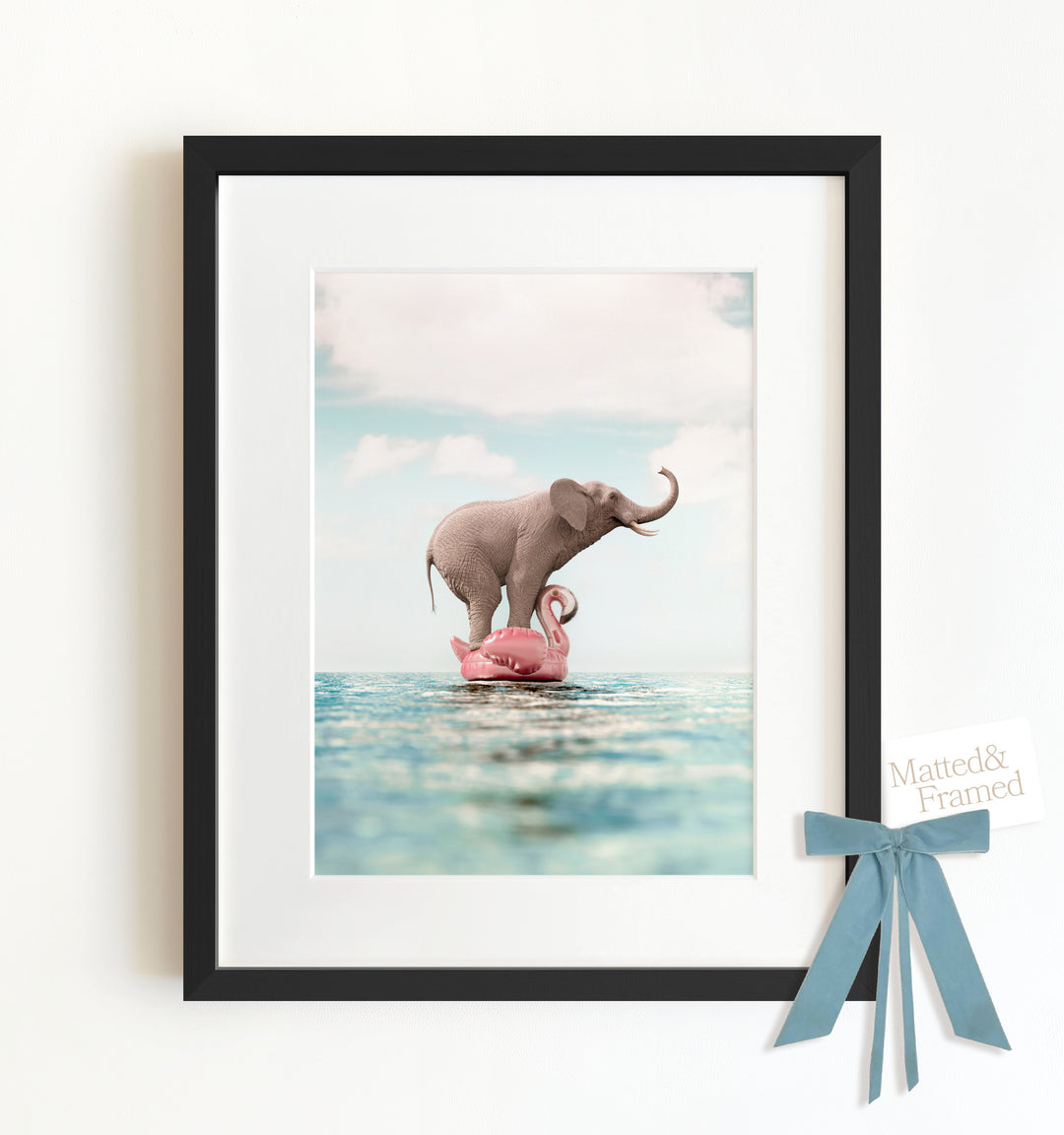 Elephant Afloat a Flamingo Framed Art