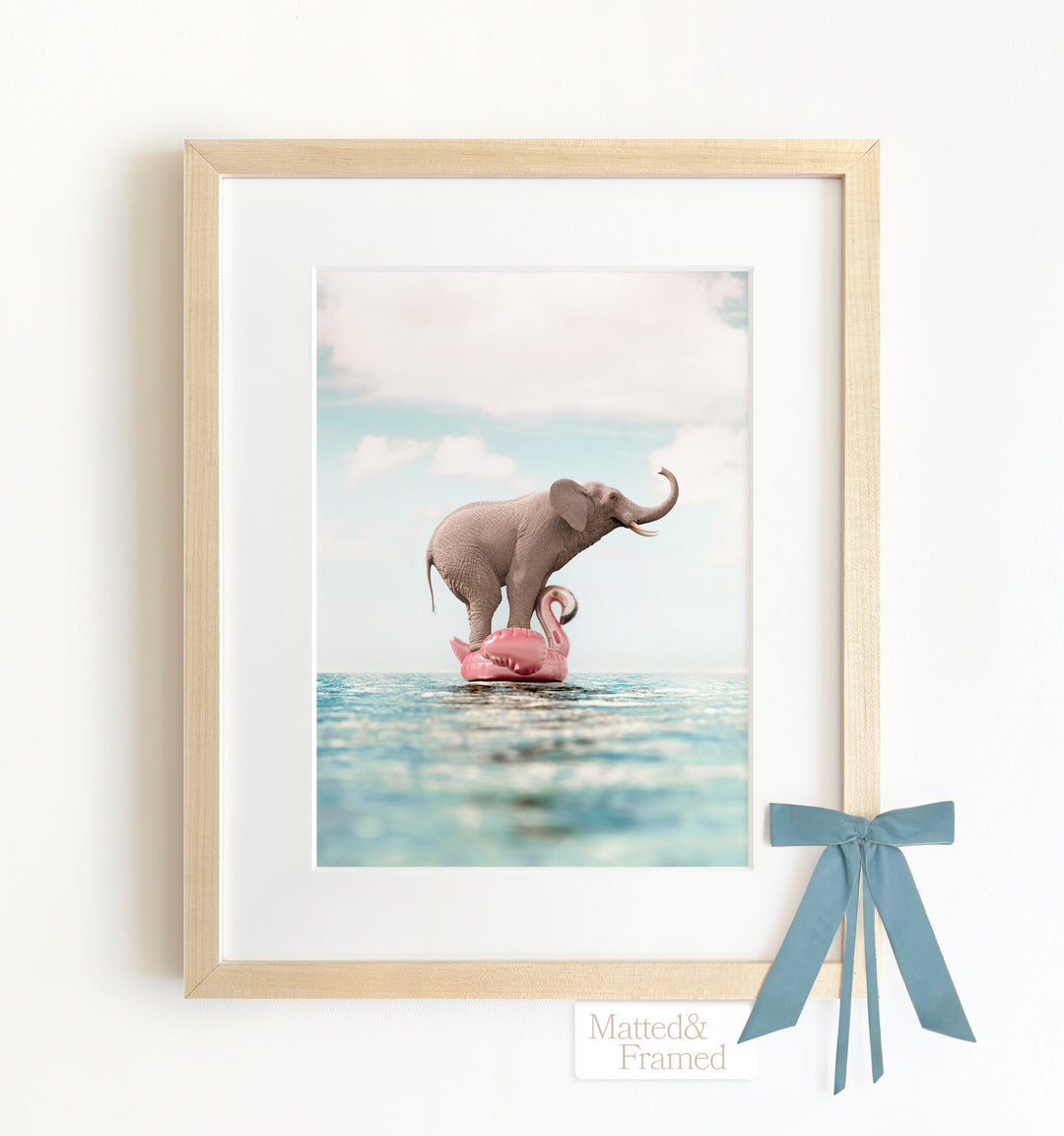 Elephant Afloat a Flamingo Framed Art