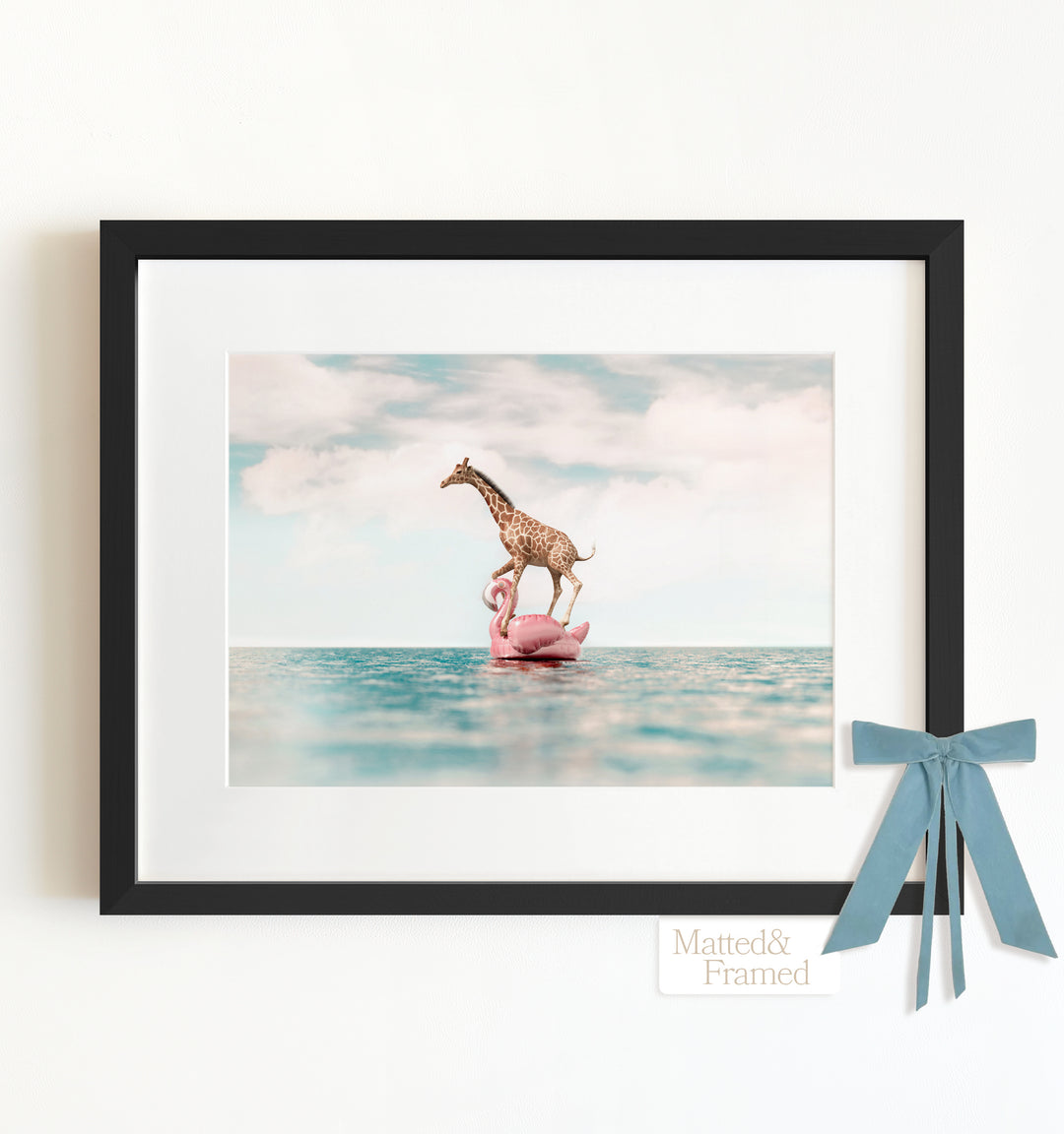 Giraffe Afloat a Flamingo Framed Art