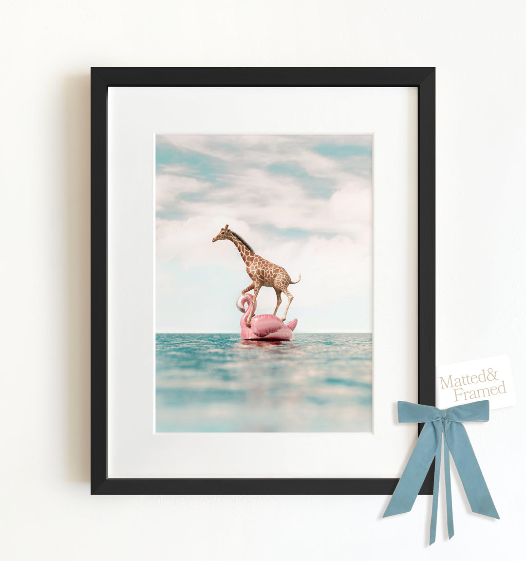 Giraffe Afloat a Flamingo Framed Art