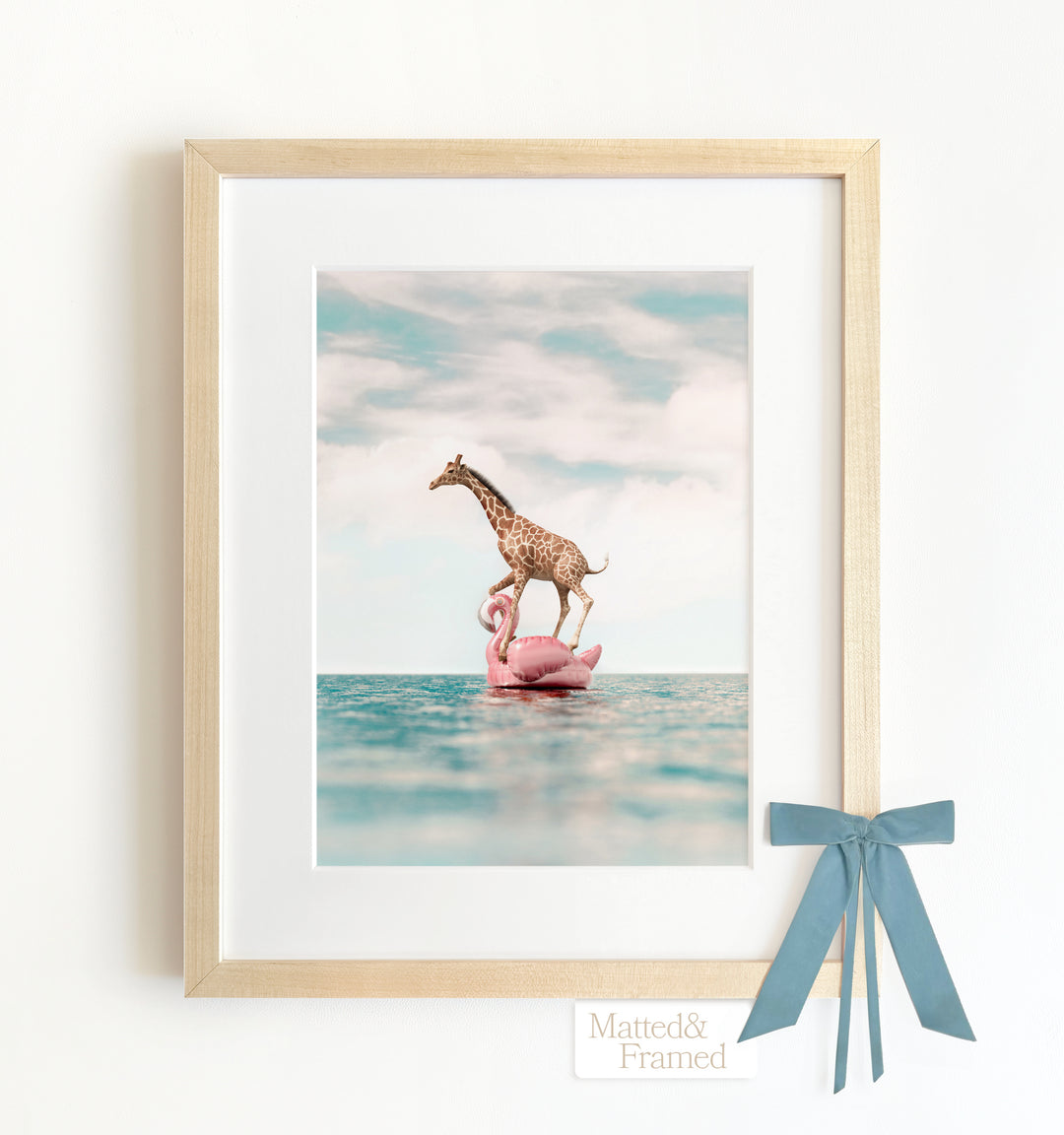 Giraffe Afloat a Flamingo Framed Art