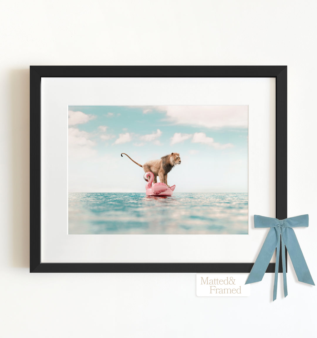 Lion Afloat a Flamingo Framed Art