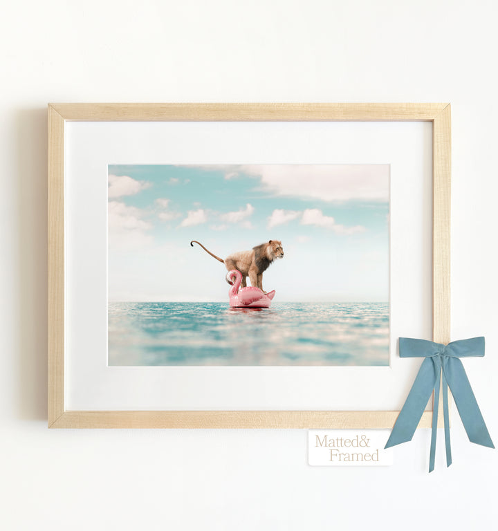 Lion Afloat a Flamingo Framed Art