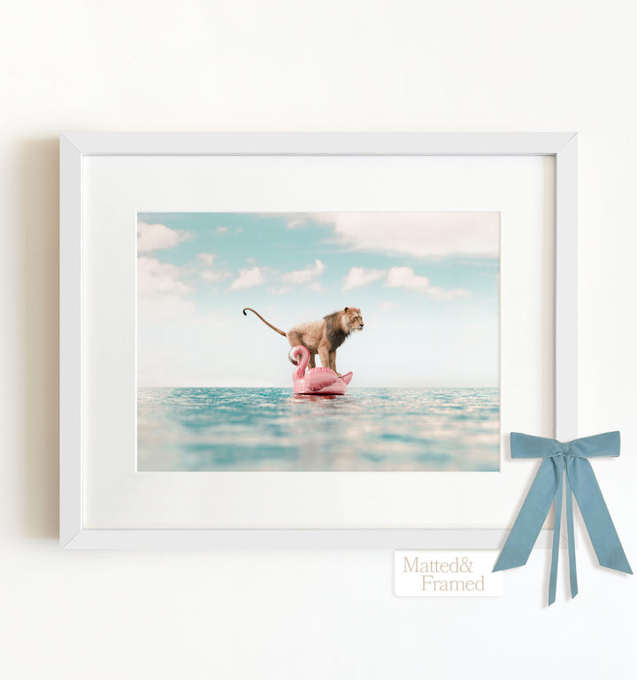 Lion Afloat a Flamingo Framed Art