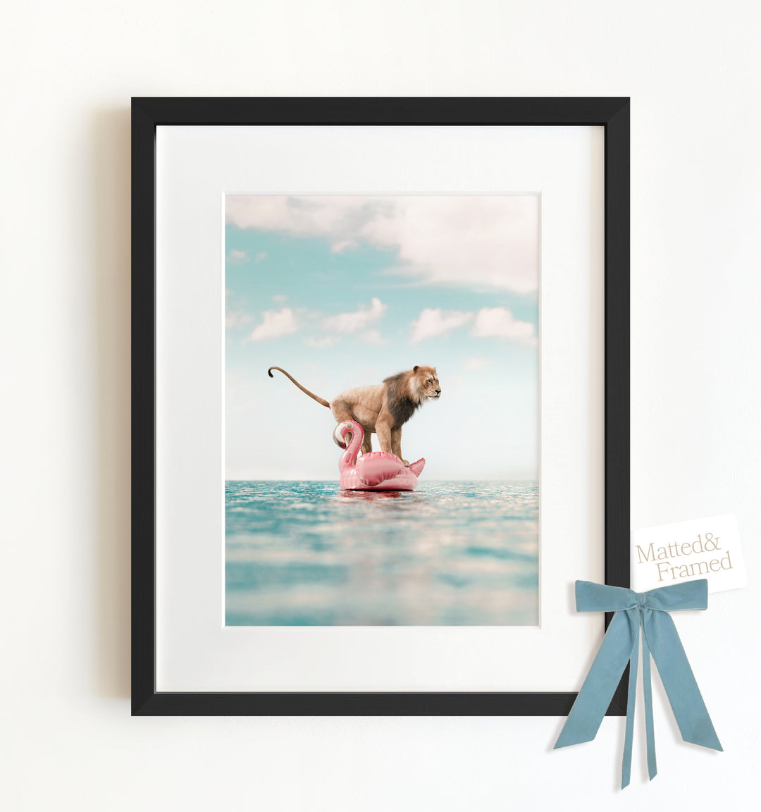 Lion Afloat a Flamingo Framed Art